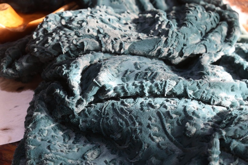 The Spruce Paisley Blanket