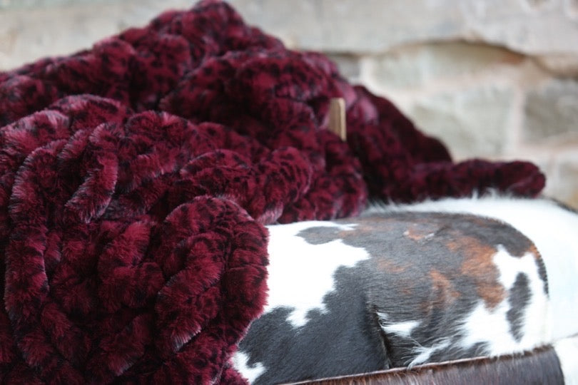 The Merlot Cheetah Milan Blanket